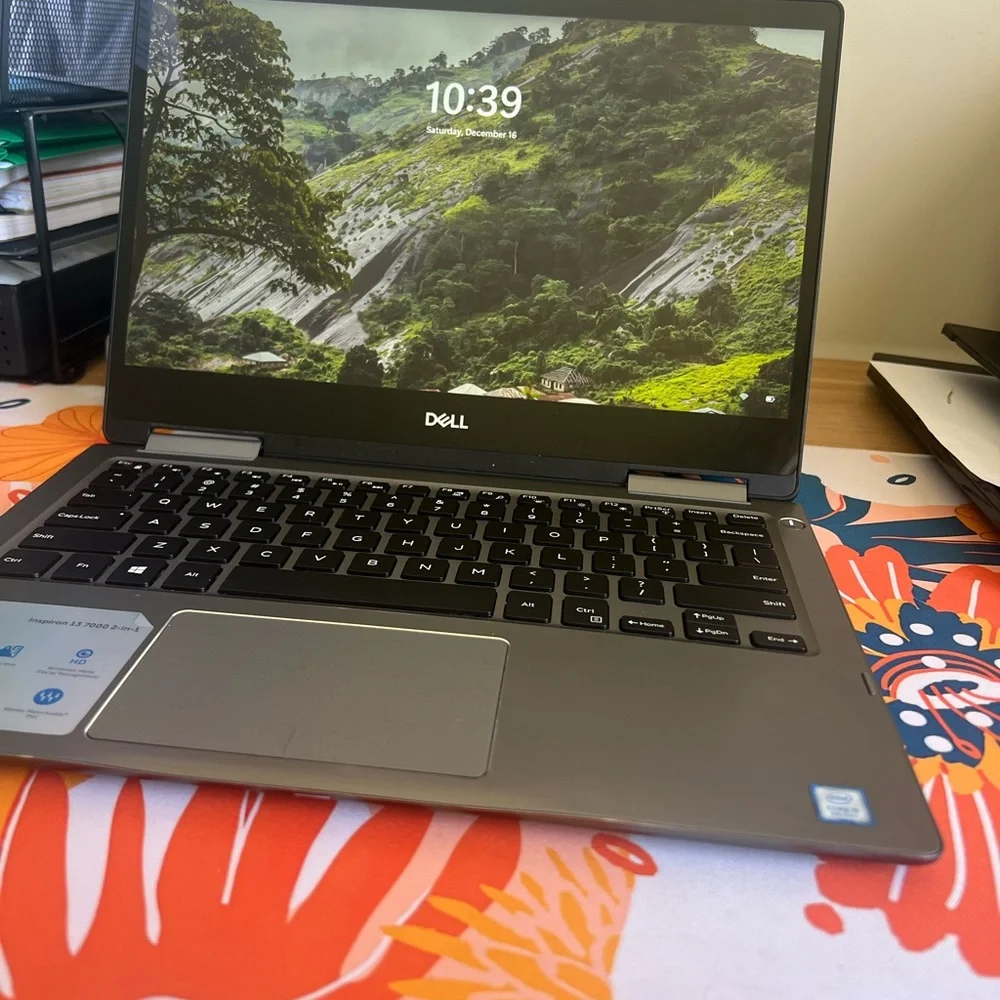 Dell Inspiron 13 7000 2in1 laptop. Converts to tablet and is touchscreen.